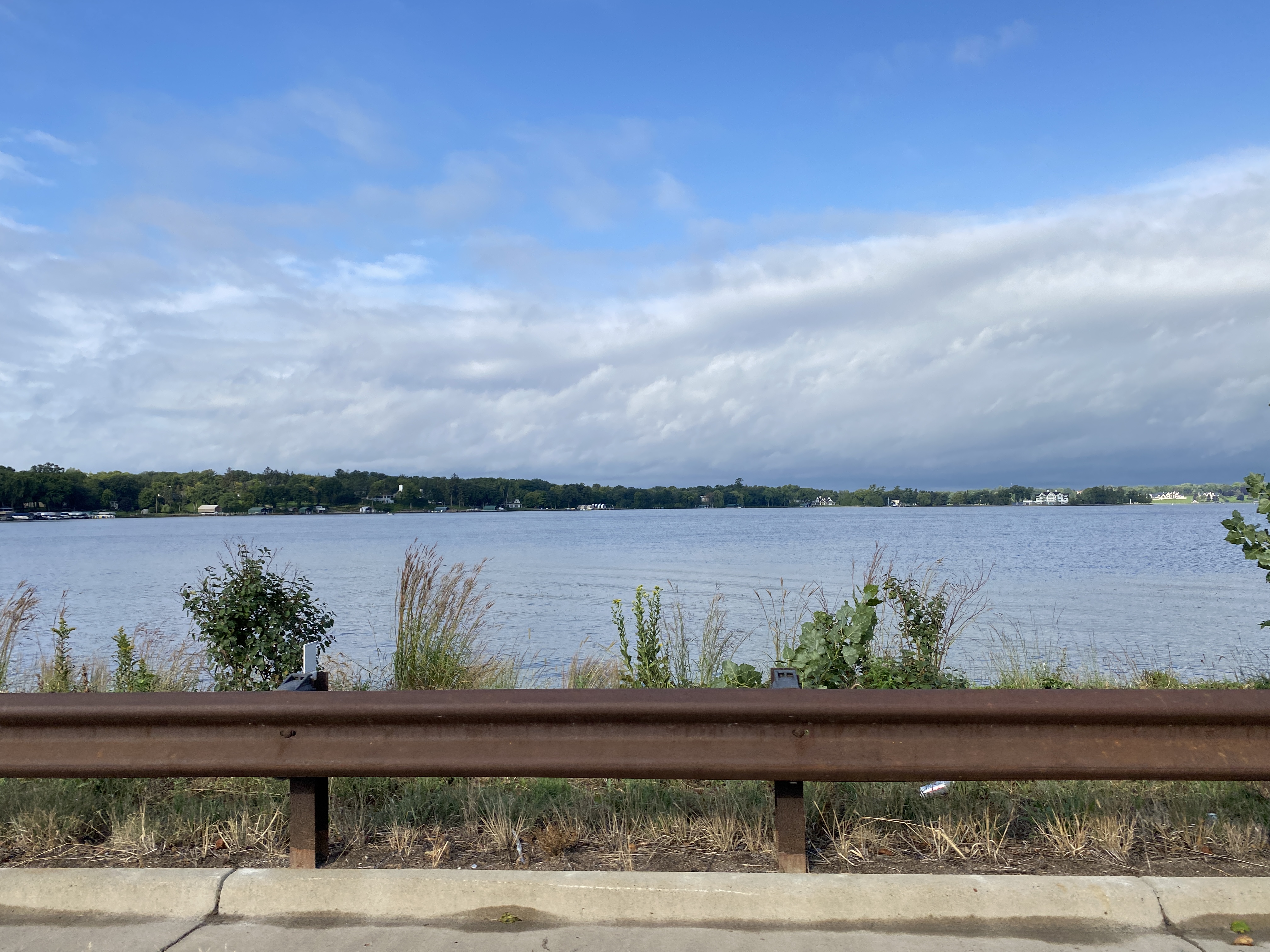 Lake Minnetonka water and distant shoreline viewed from Bushaway Road