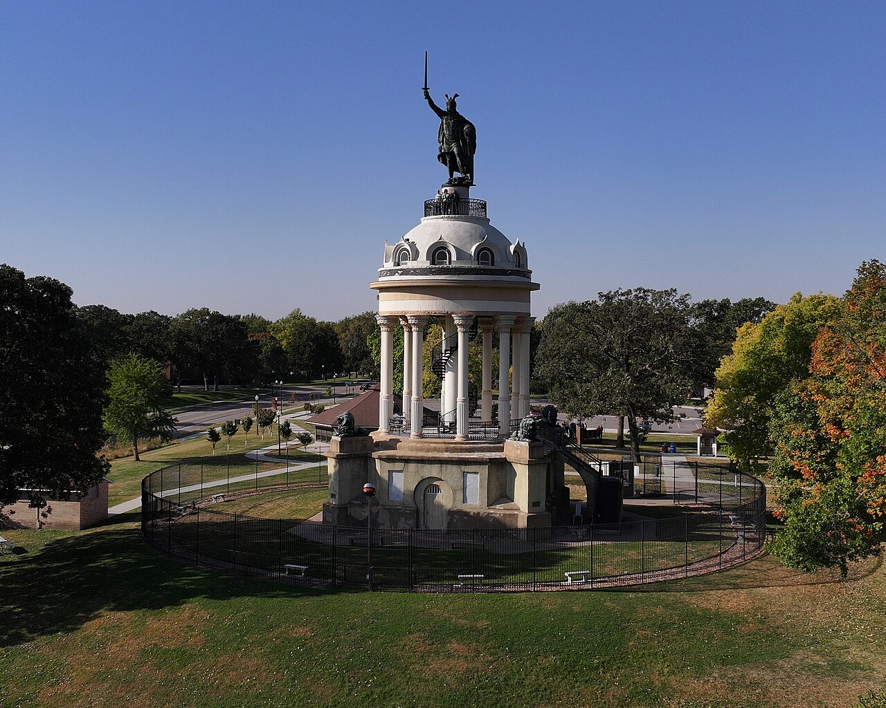 Hermann Monument rising above its columned base and park grounds in New Ulm